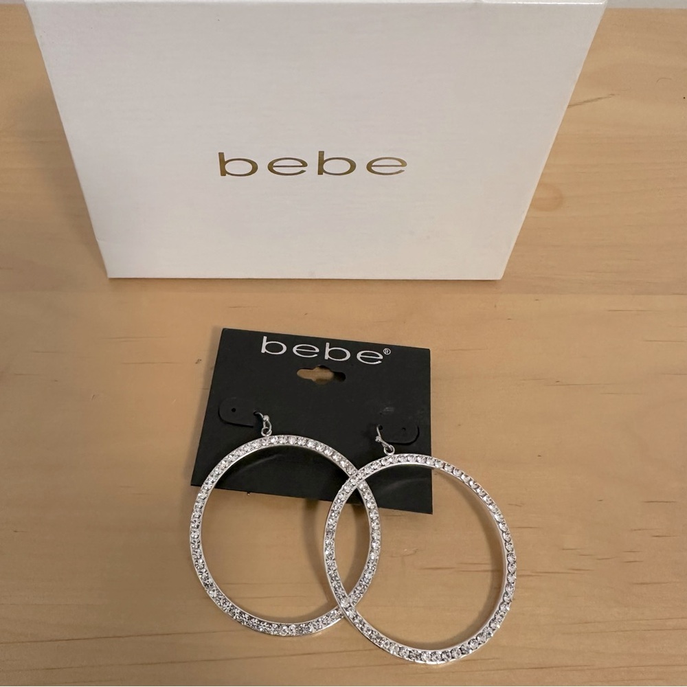 New in box Bebe jewelry! Gorgeous pave rhinestone hoop earrings!